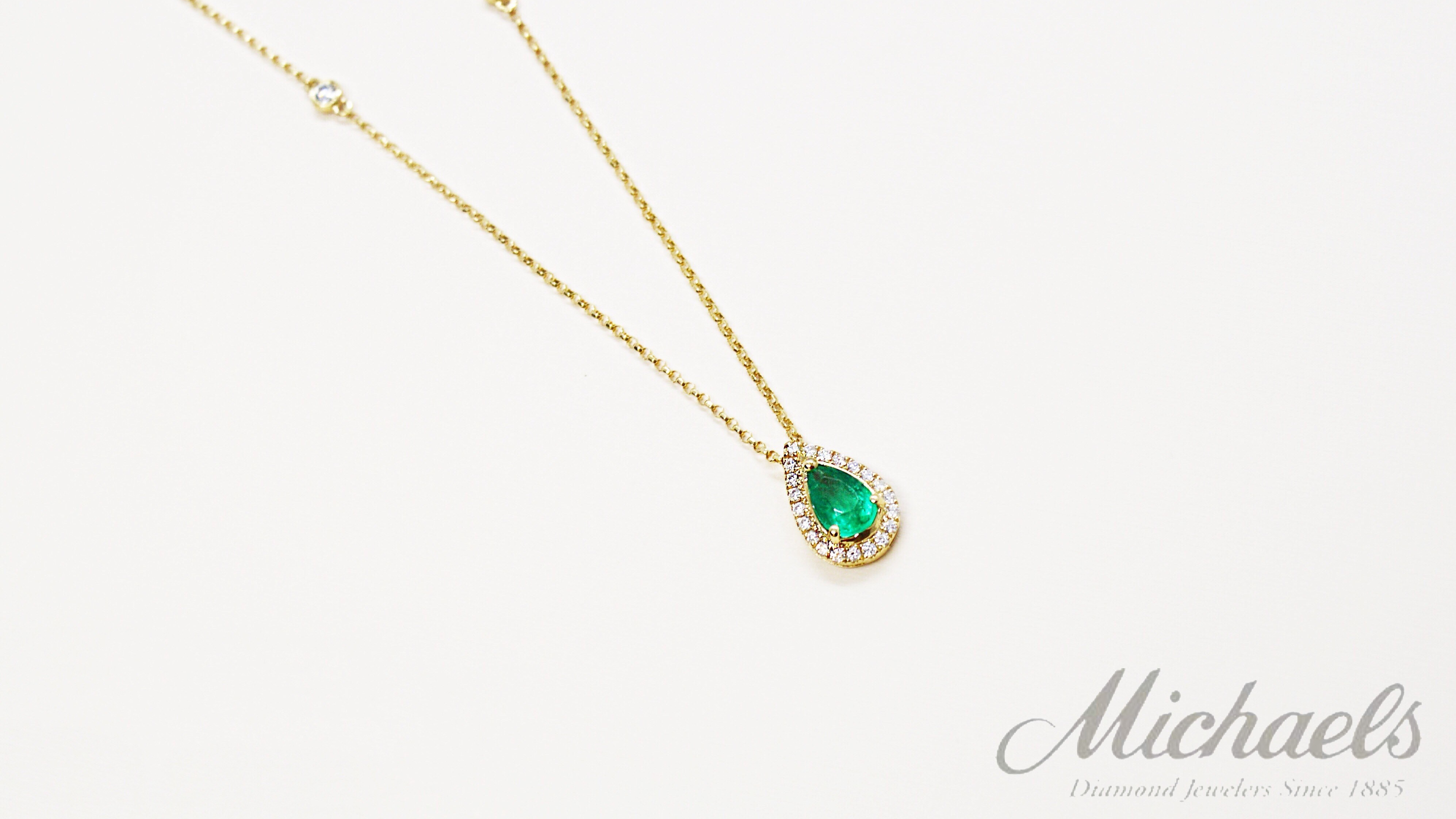 emerald-pear-shape-halo-necklace1.jpg